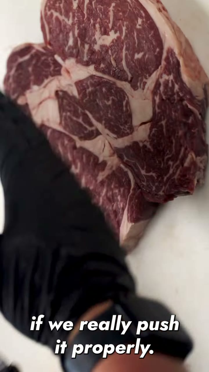 Dry-aged ribeyes being portioned